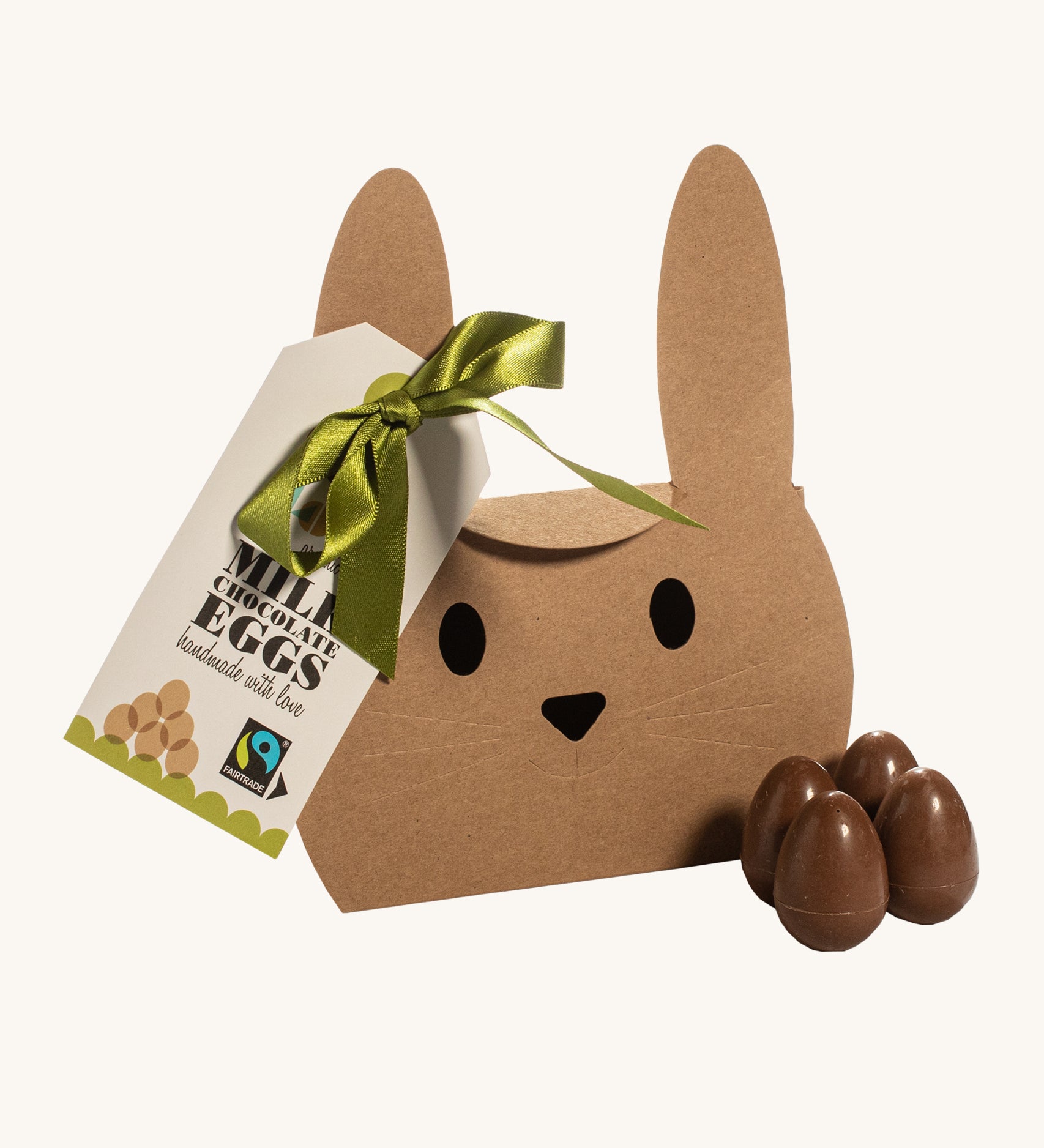 Cocoa Loco organic Fairtrade mini milk chocolate eggs presented with its bunny shaped eco-friendly packaging.