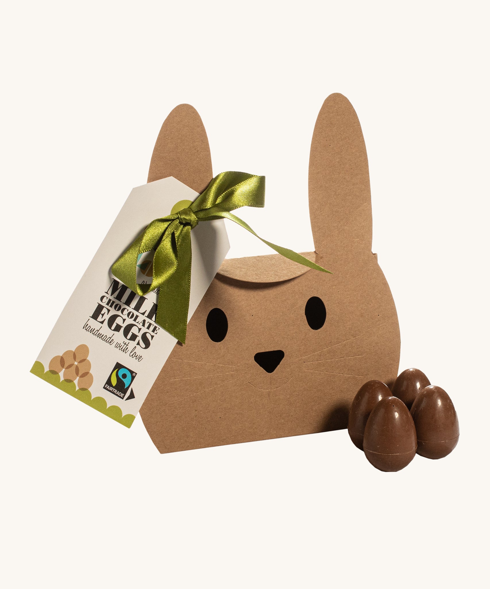 Cocoa Loco organic Fairtrade mini milk chocolate eggs presented with its bunny shaped eco-friendly packaging.