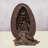 Cocoa Loco oragnic Fairtrade vegan dark chocolate easter egg, halved to reveal a cascade of dark chocolate buttons.