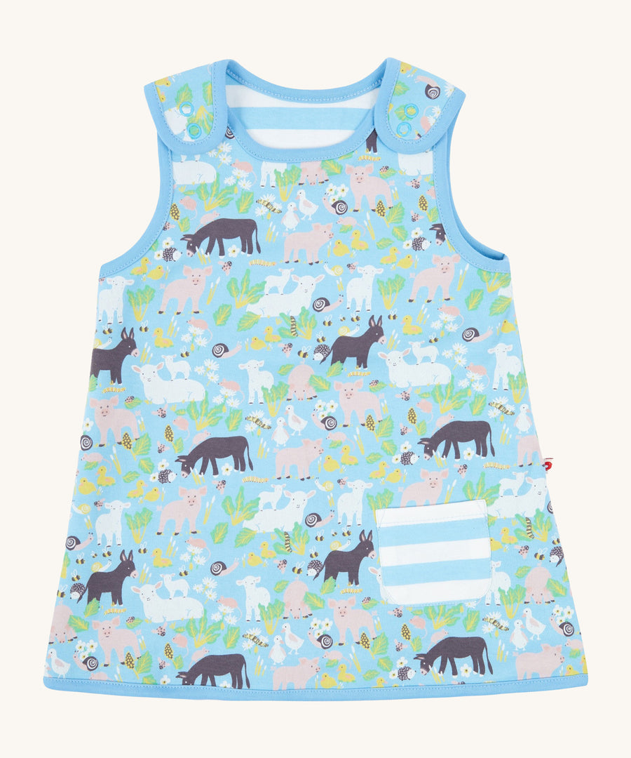 A closer look at the farmyard animal print on the Piccalilly Country Friends Reversible Dress