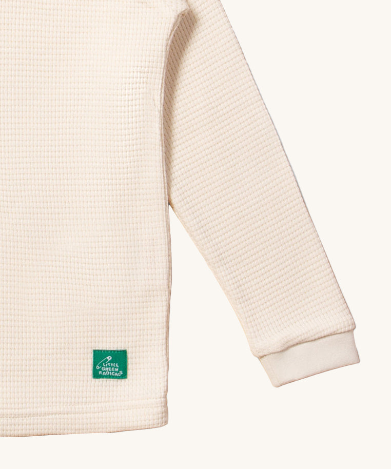 A closer look at the waffle textre fabric on the LGR Long Sleeve Waffle Top - Cream