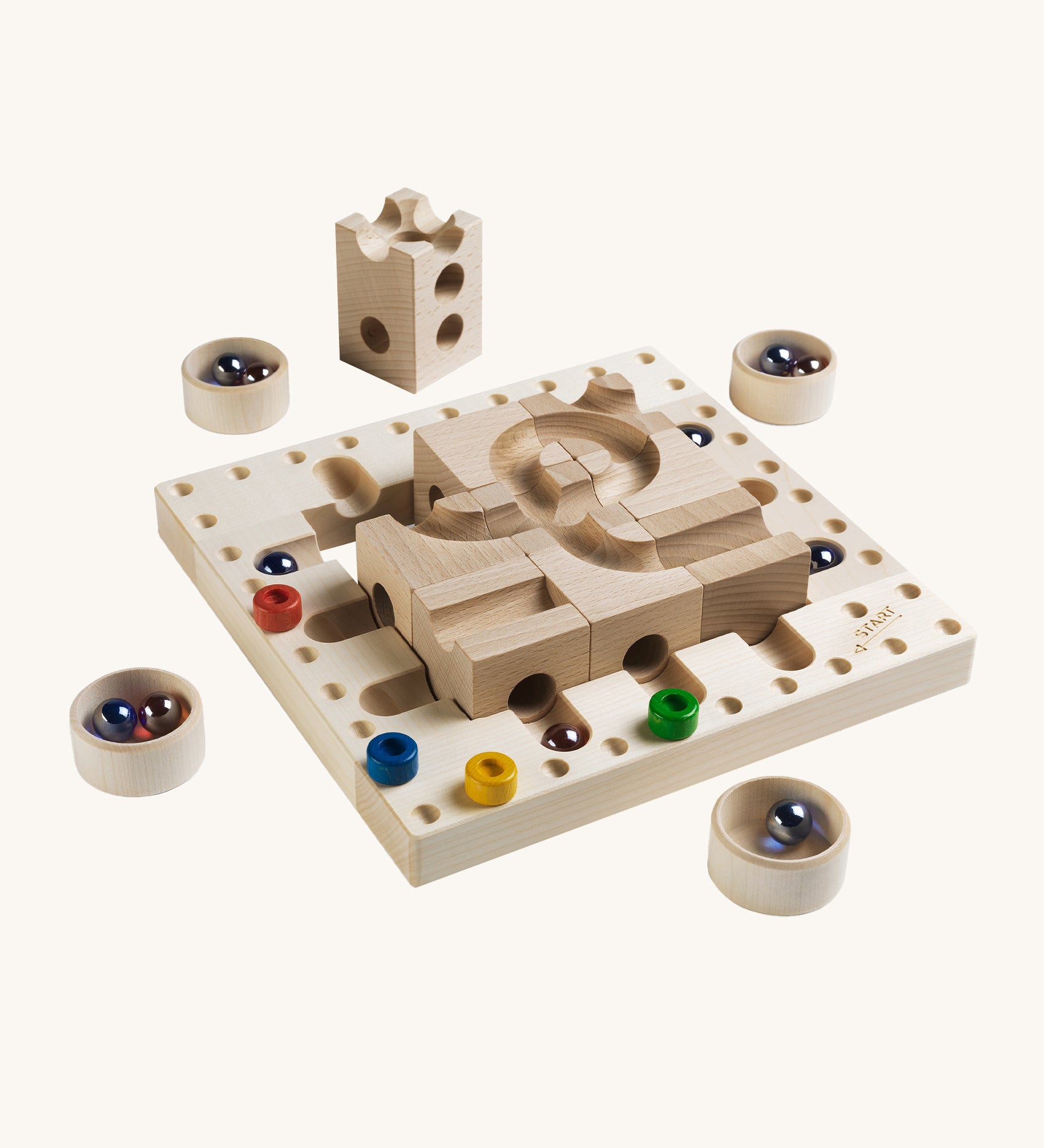 Cuboro Tricky Ways Board Game on a cream background. The image shows a wooden peg board with a marble run block section in the middle, 4 wooden small bowls each with some marbles inside.