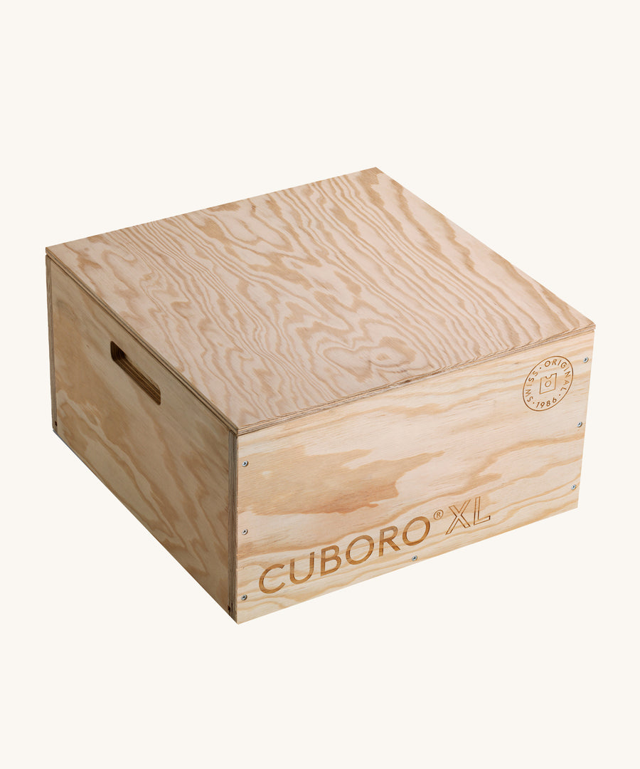 The Cuboro XL Wooden Marble Run Set with the lid closed on a cream background