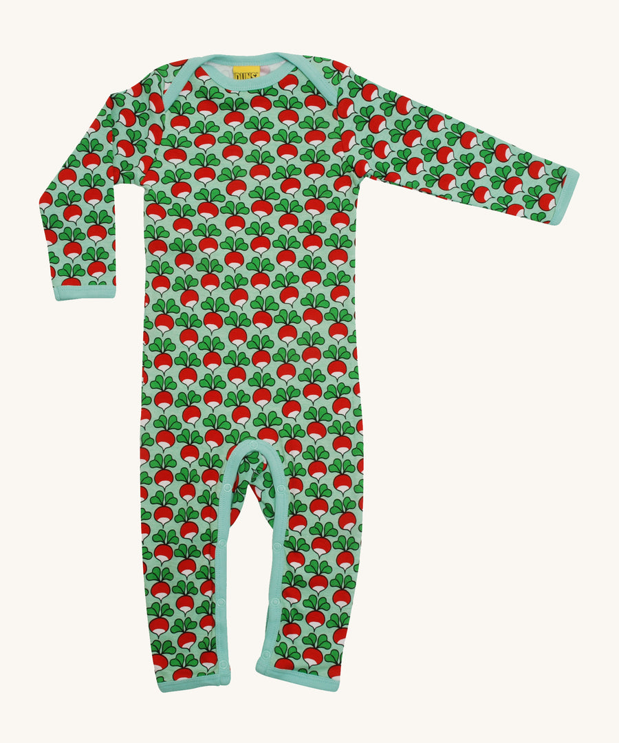 A soft, organic cotton, long sleeve bodysuit in mist green. With a repeat radish print pattern and light blue piping and poppers on the inside of the legs