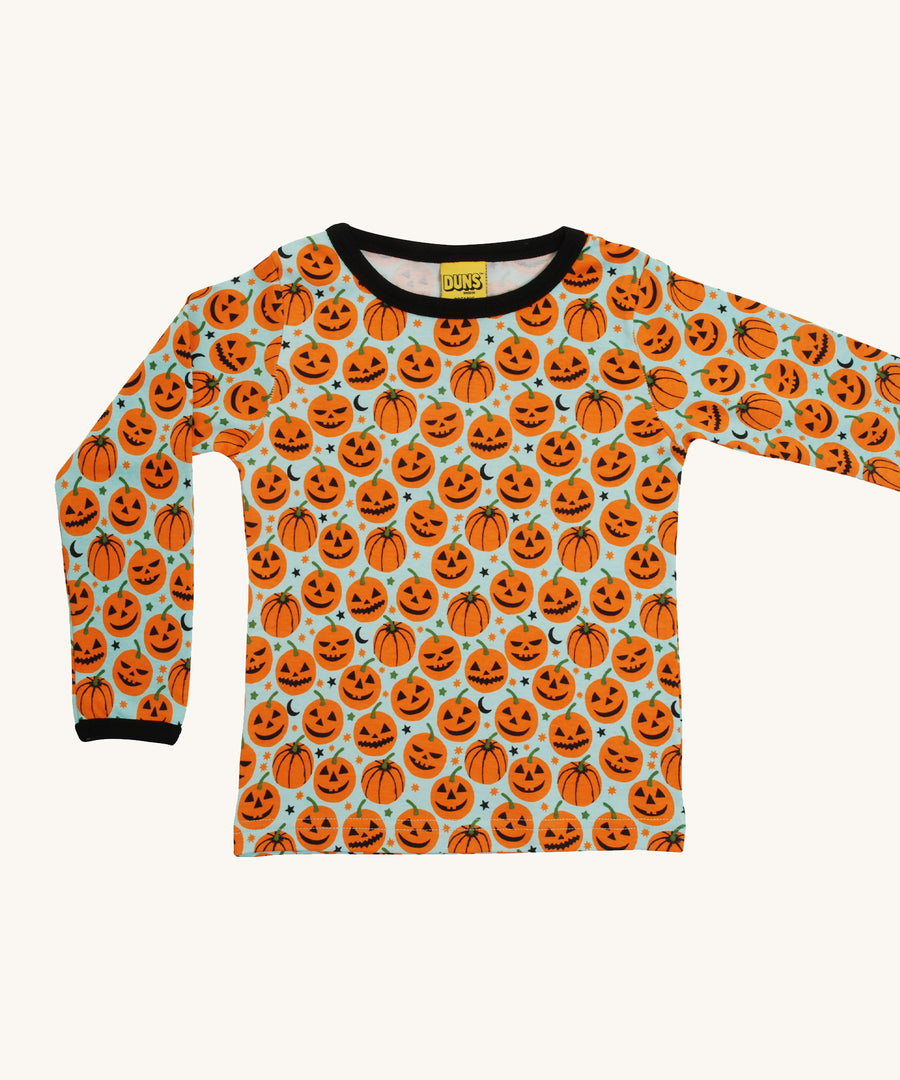 DUNS festive Pumpkin Scandi all-over print, with a light blue background and contrasting black cuffs