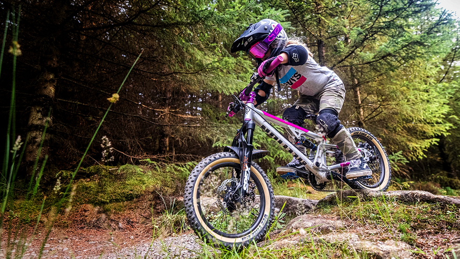 Child off-road cycling on an Early Rider mountain bike