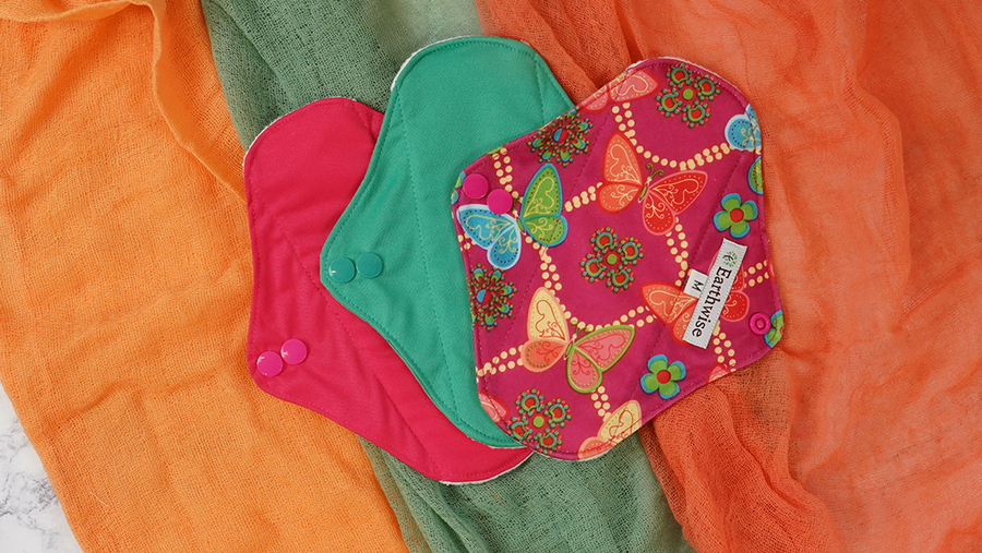 Three Earthwise reusable menstrual period pads