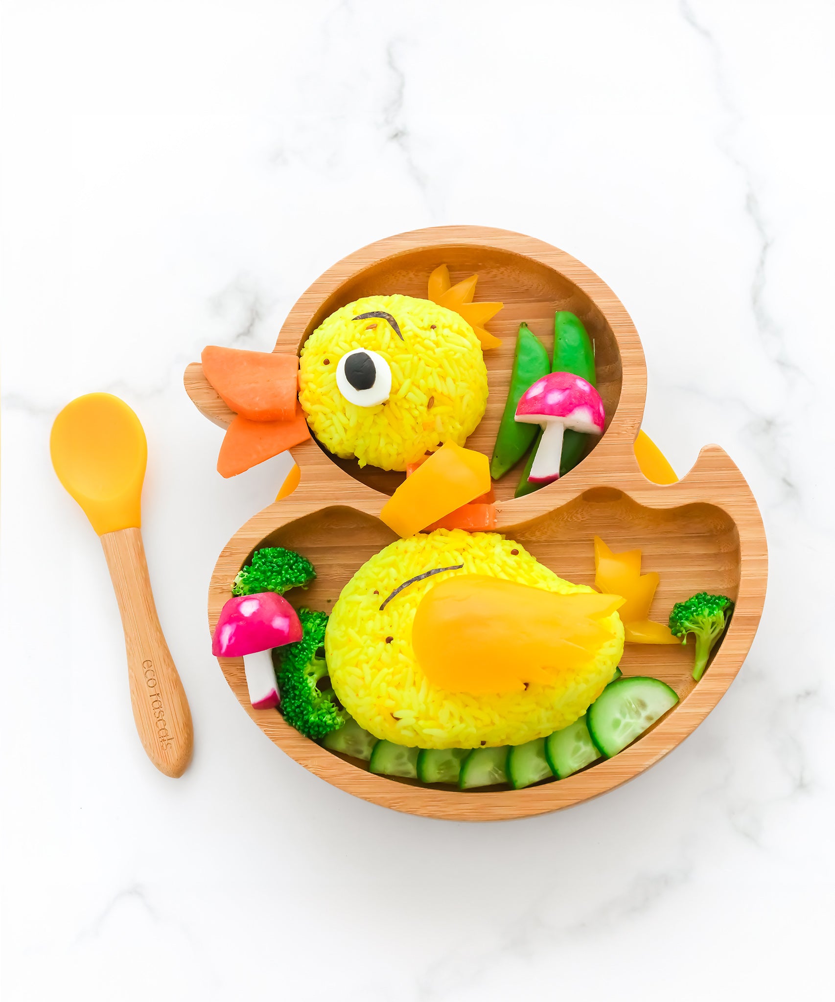 Eco Rascals Duck Bamboo Suction Plate, with yellow rice decorated to look like a duck!