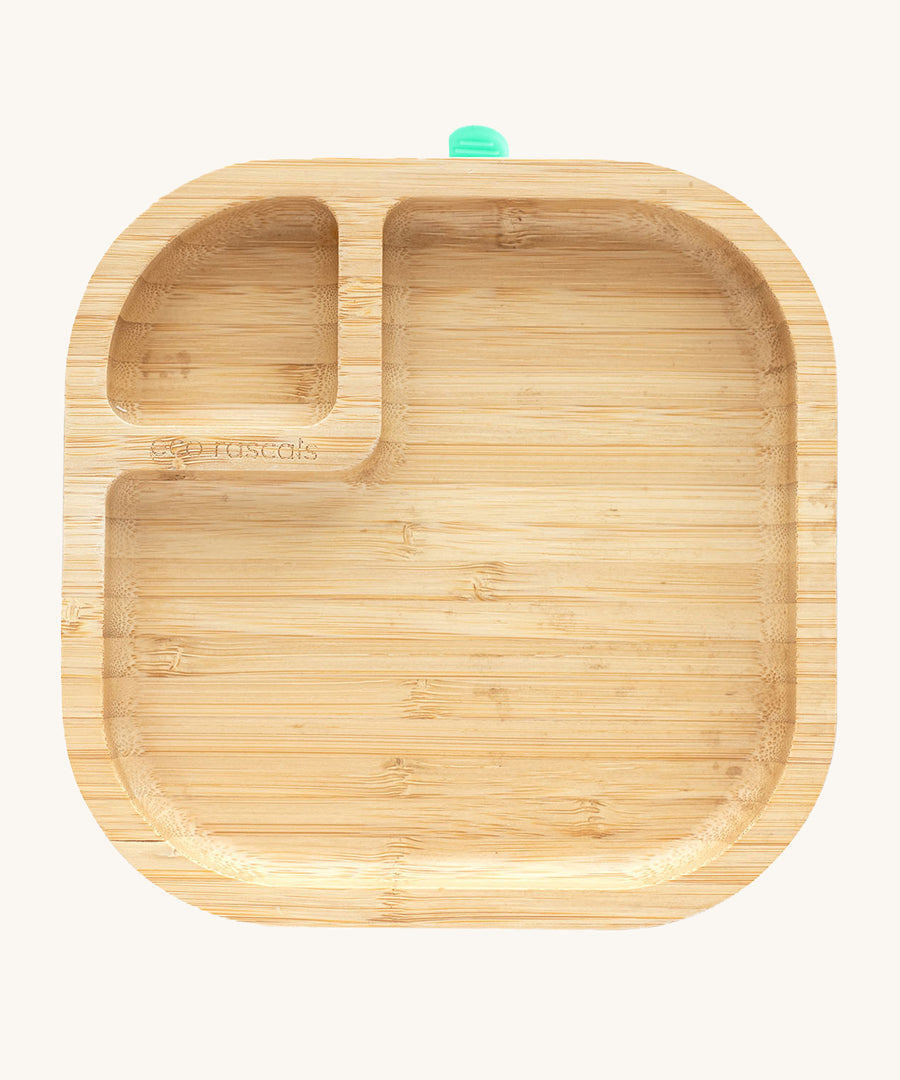 Eco Rascals Natural Bamboo Square Plate with two food sections, with super suction cup. On a cream background