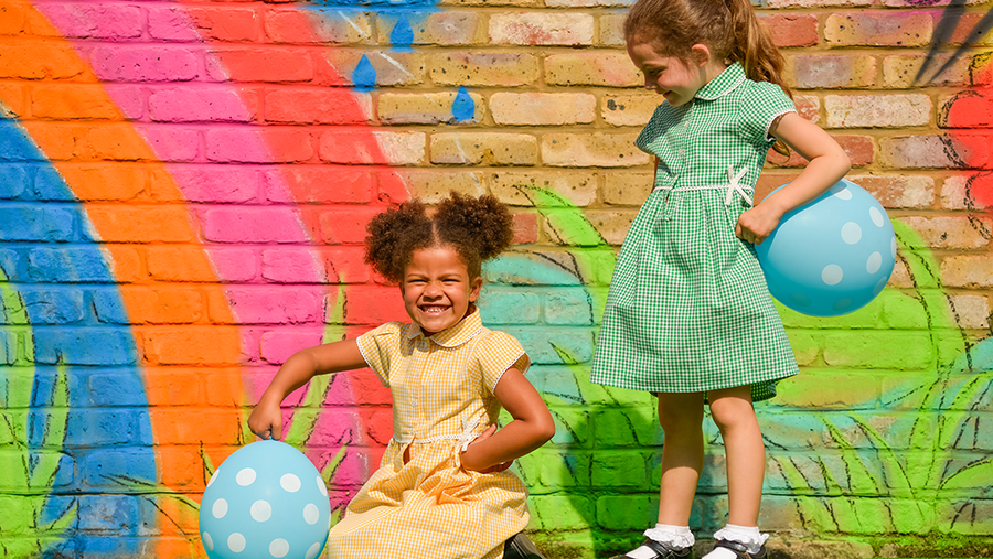 Two school kids wearing Eco Outfitters school uniforms