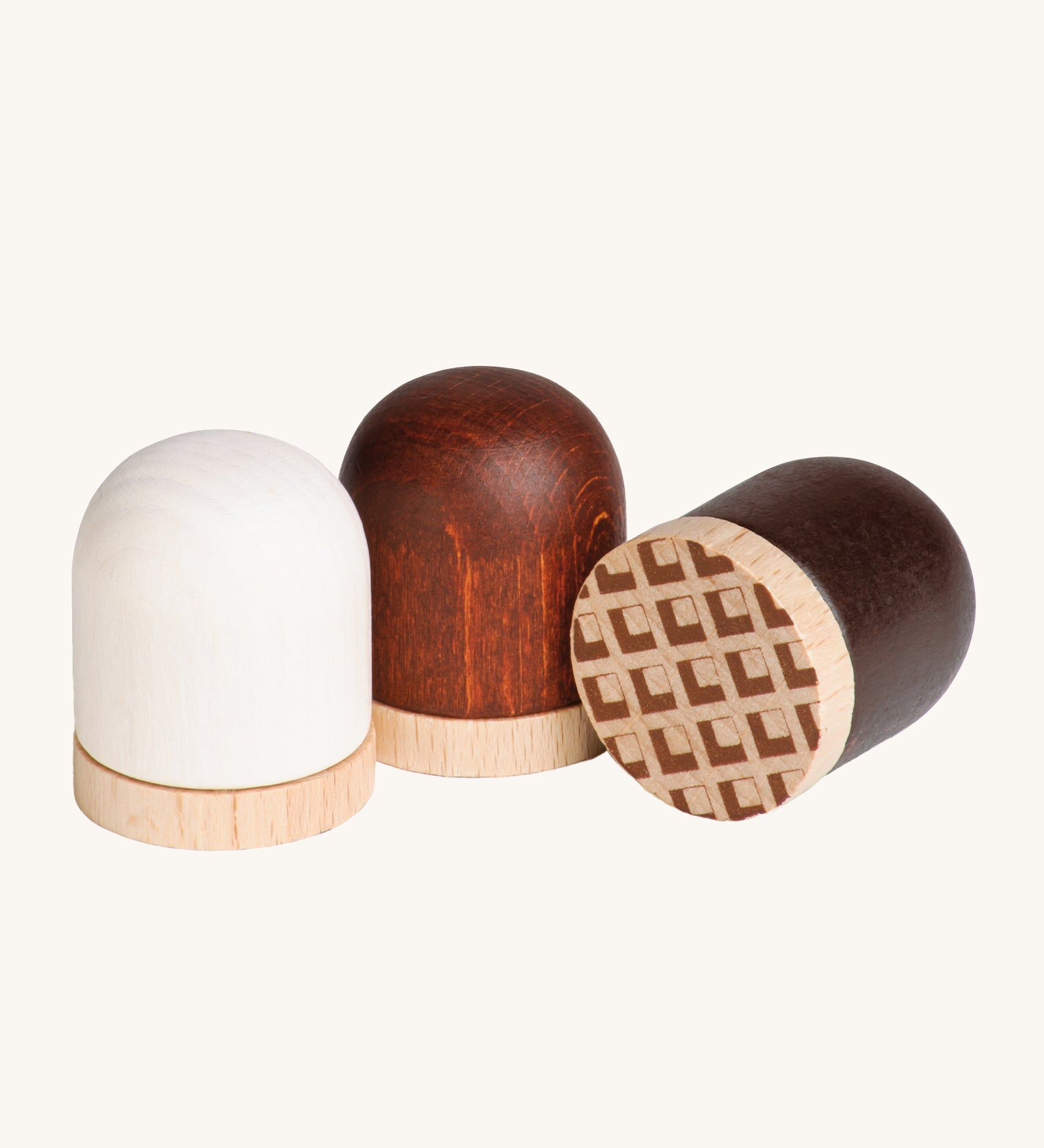 A closer look at the Erzi Toys marshmallows, showing the natural wood grain through the paint work.