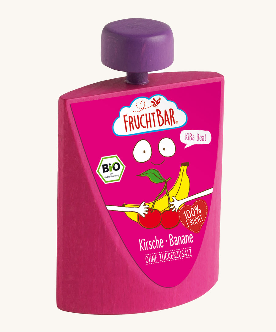 Erzi Wooden Squeezy Cherry & Banana Fruit Pouch. A bright pink wooden pouch, with a purple top, with a fun graphic banana and cherry label. On a Cream background