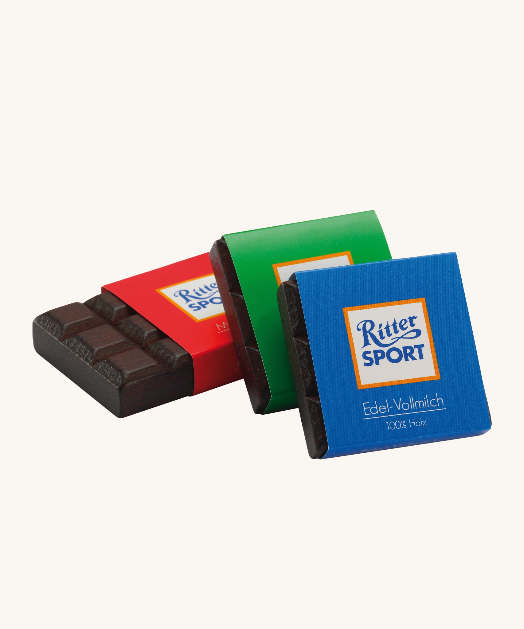 Erzi Wooden Mini Chocolate Bars. Ralistic Ritter Sport wooden chocolate bars, with a red, green and blue wrapper