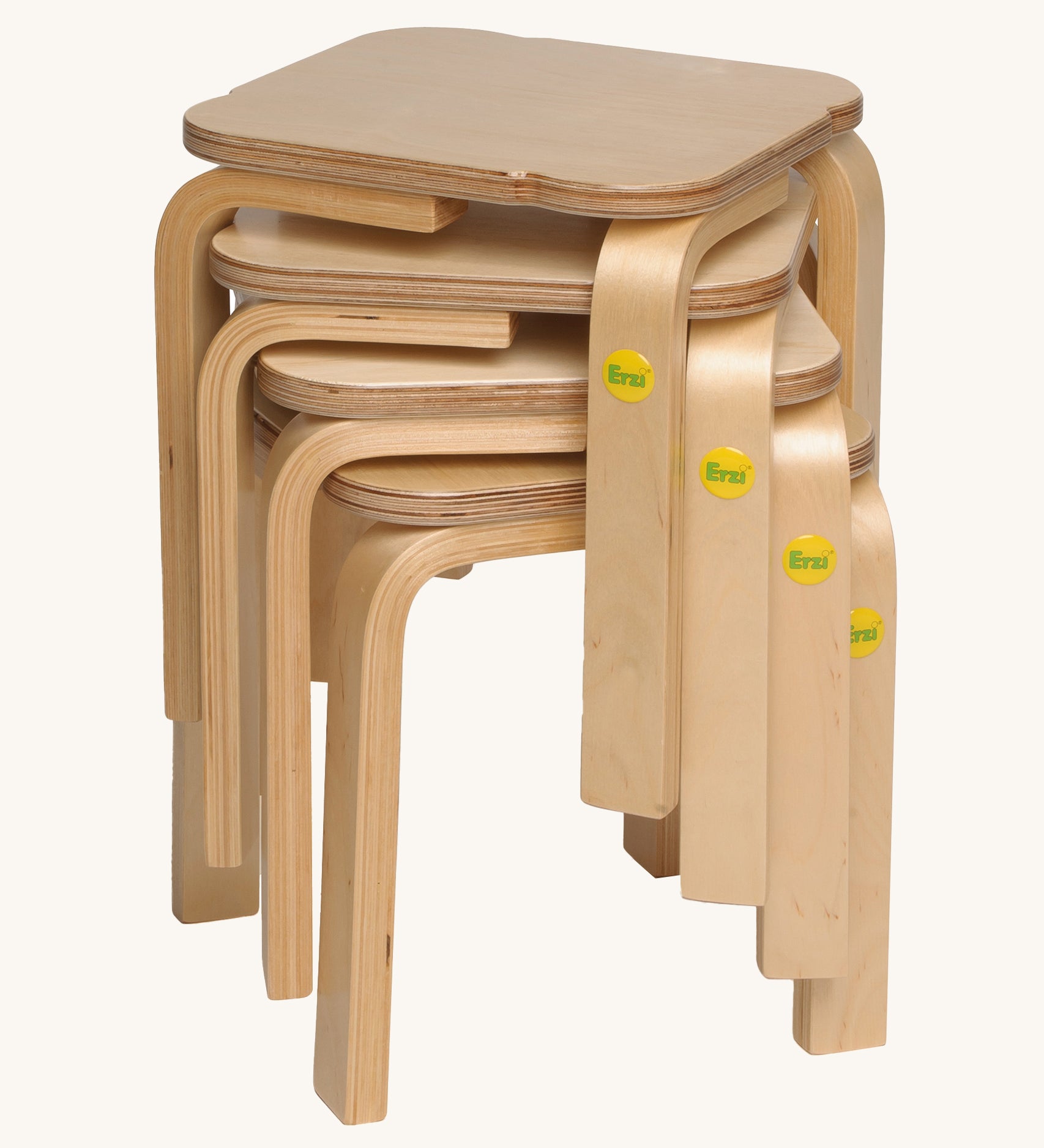 A stack of Erzi Toy stool ontop of each other, with the Erzi logo on the leg. Great for small storage spaces!