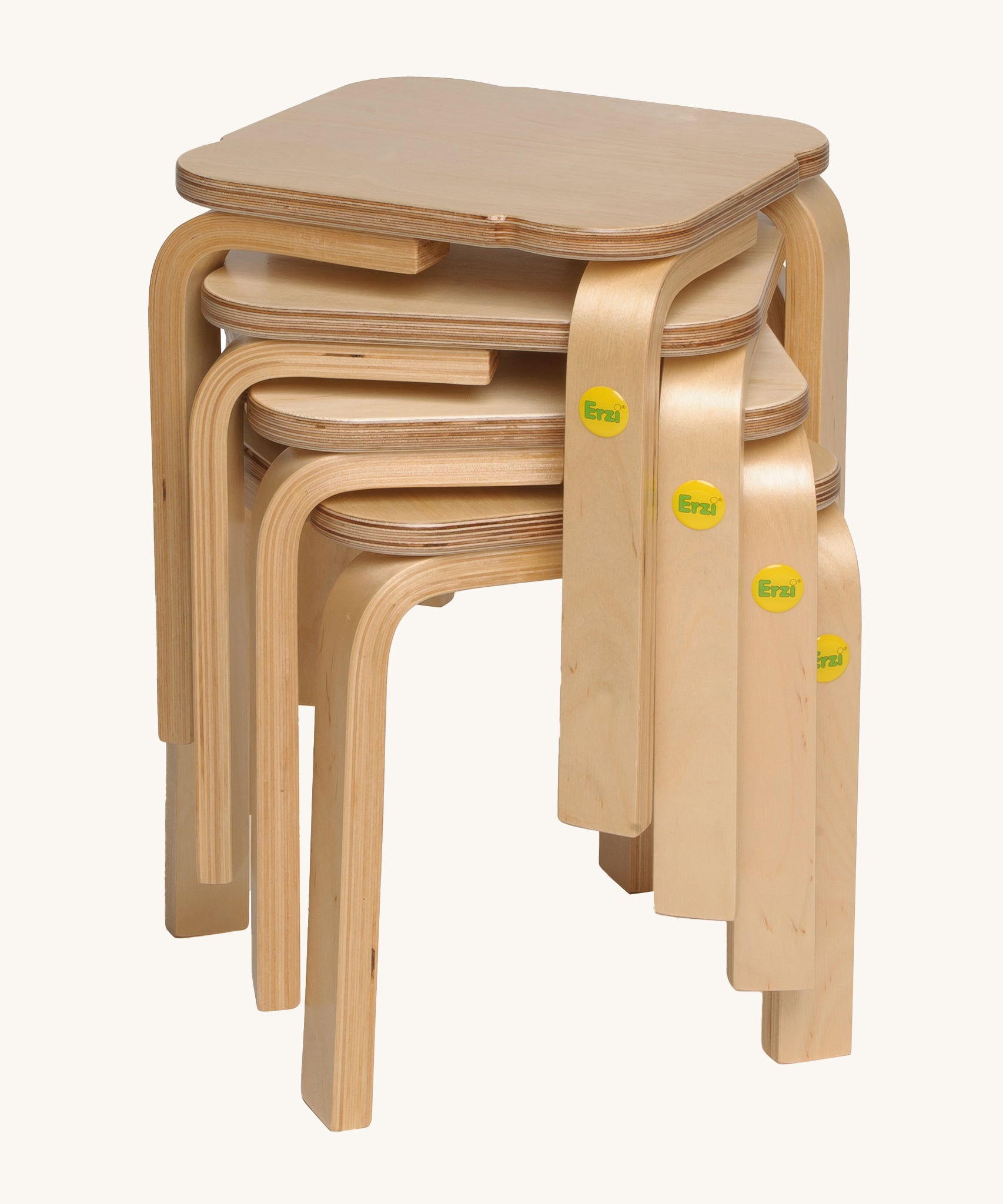 A stack of Erzi Toy stool ontop of each other, with the Erzi logo on the leg. Great for small storage spaces!