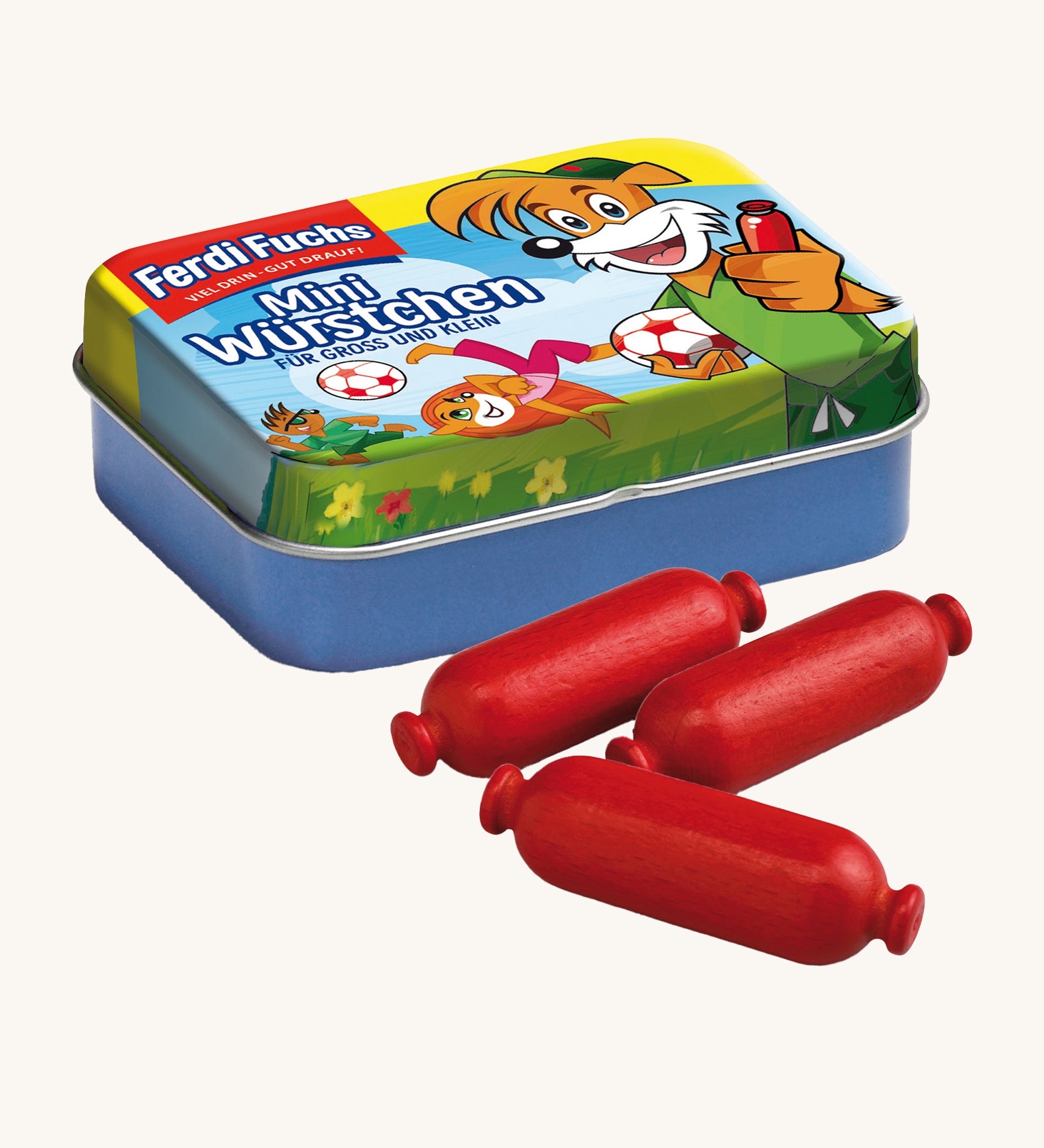 Erzi Wooden Mini Sausages In A Tin. 3 mini wooden sausages in a dark red colour are placed in front of a colourful mini sausages tin. On a cream background