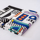 A closer look at the patterns of the Etta Loves x Camille Walala Muslin Cloths - 2 Pack