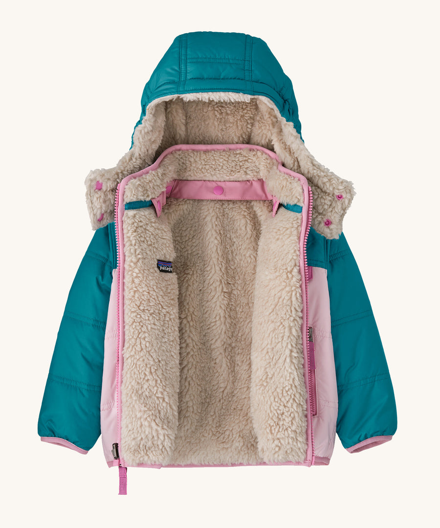 An open Patagonia Baby Reversible Tribbles Hoody showing the fleece lining and removable hood