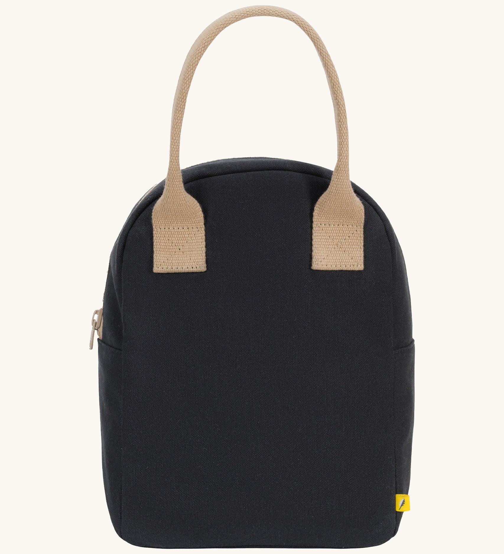 Fluf zip lunch bag in a solid black colour with a light brown handle on a cream background.