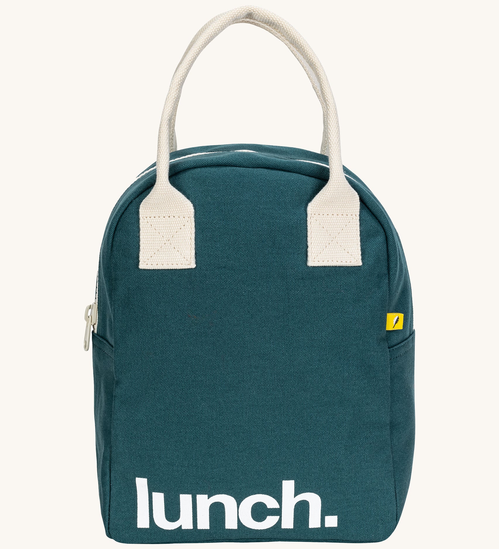 Fluf zip lunch bag in a teal blue colour with lunch printed on the front in white with a white handle and zip detail on a cream background.