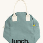 Fluf zip lunch bag in a light pastel blue colour laid flat with a white handle and lunch logo on the bottom on a cream background.