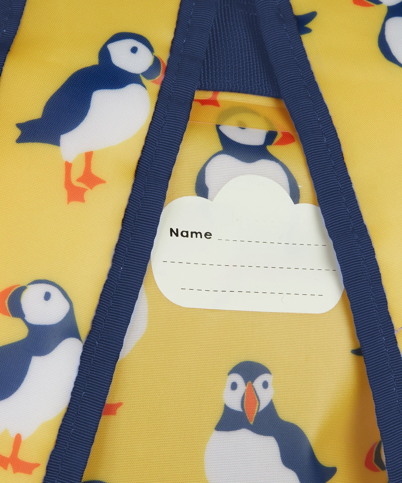 Frugi yellow dry bag puffin design name tag detail