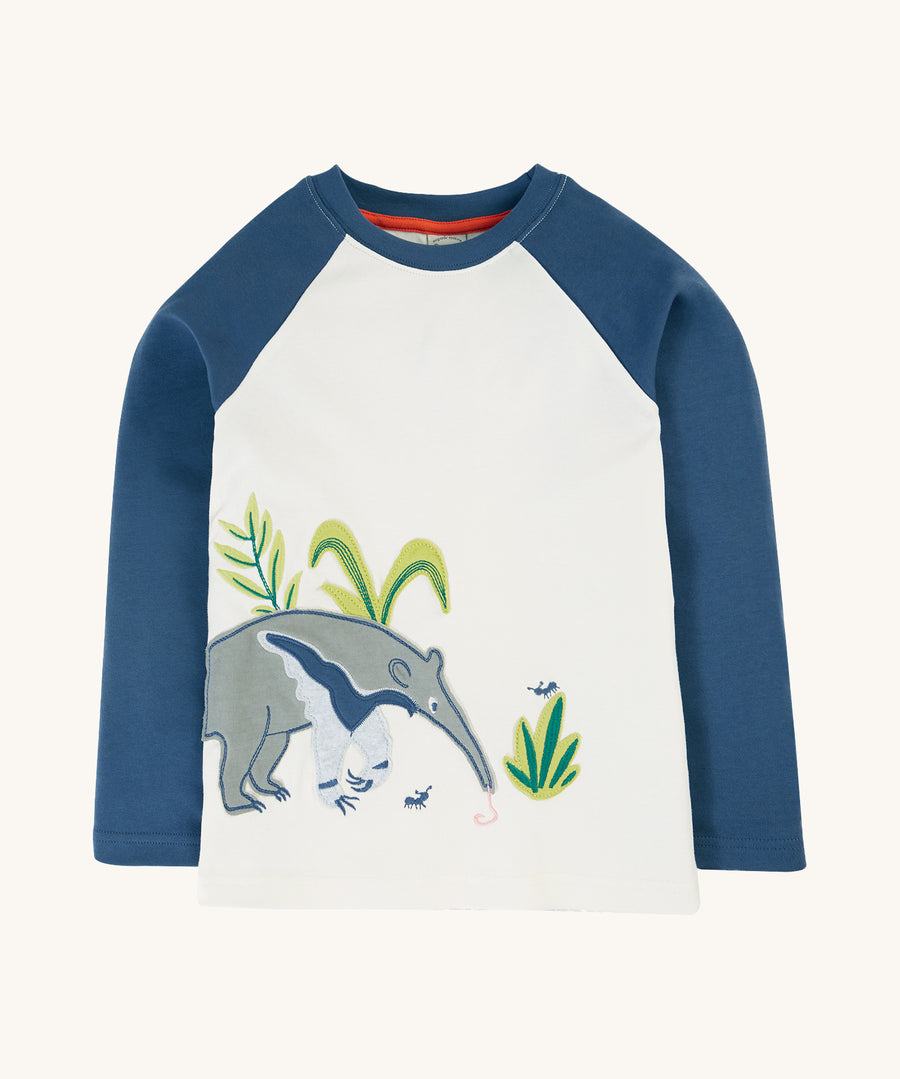 Frugi Alfie Raglan Top - Navy Blue/Anteater. An organic cotton, long sleeve, raglan top with navy blue sleeves, a white body and a large anteater applique on the front