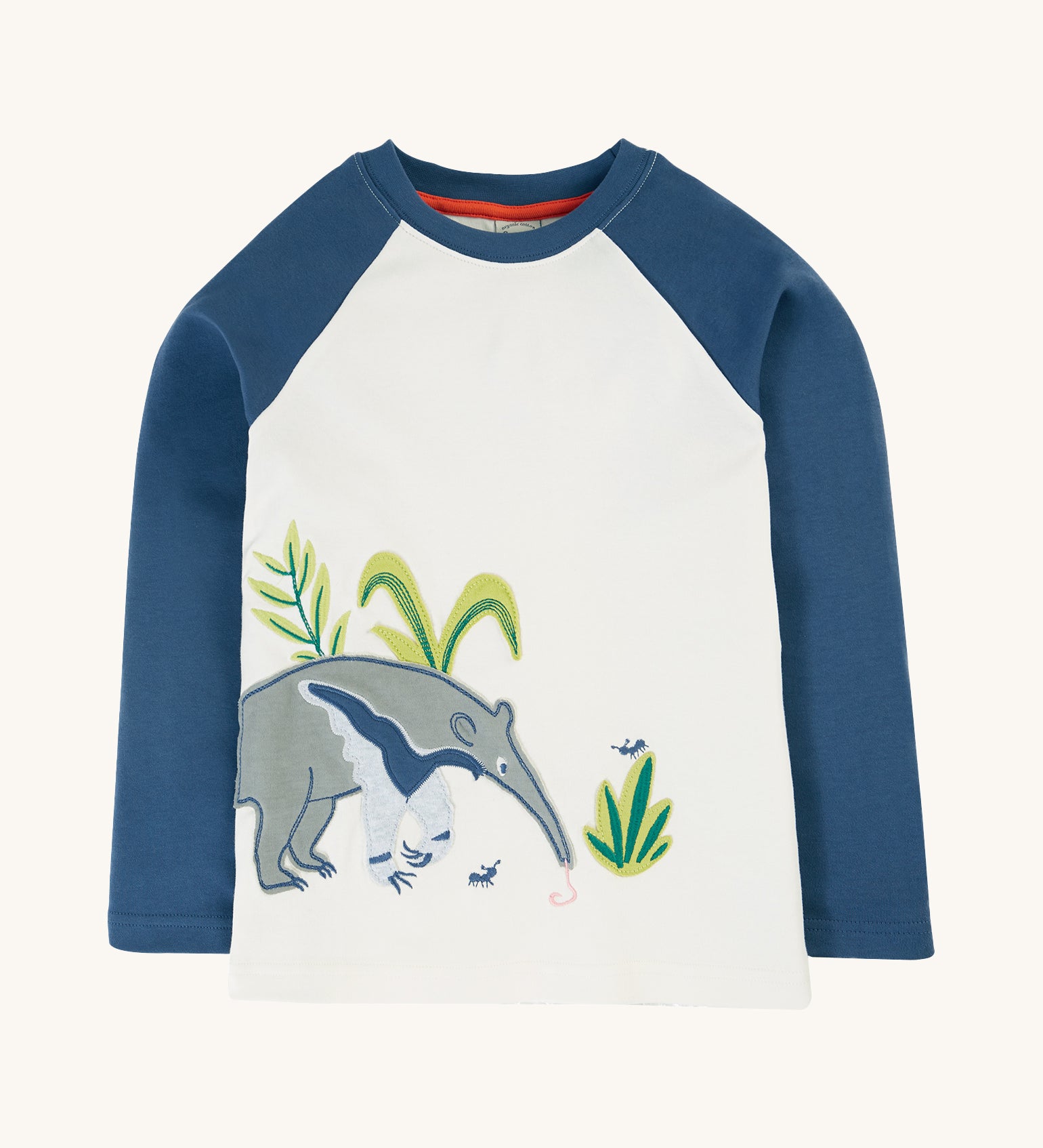 Frugi Alfie Raglan Top - Navy Blue/Anteater. An organic cotton, long sleeve, raglan top with navy blue sleeves, a white body and a large anteater applique on the front