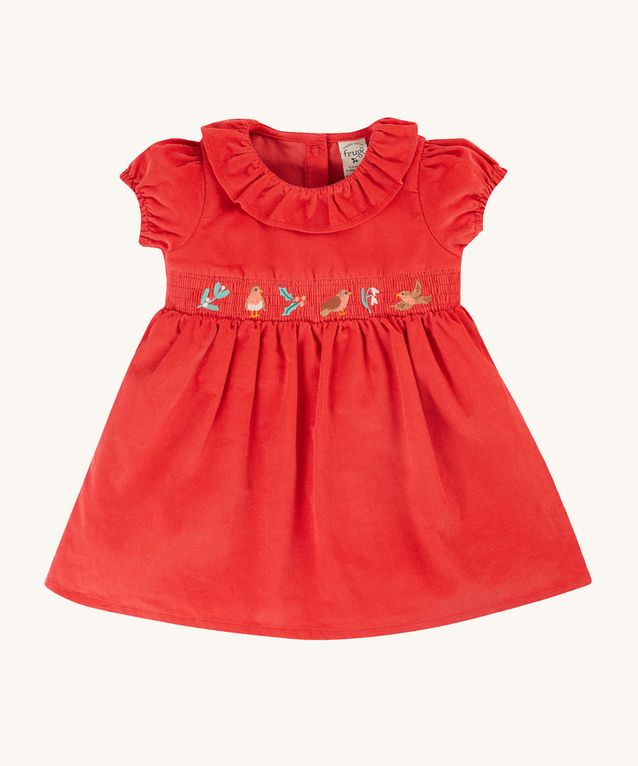 Frugi Amilie Party Dress - True Red/Robin. Made from soft organic cotton cord, in Red with a Robin embroidered on the front, this dress features a smocked panel with  a frill collar and gathered sleeves and poppers on the back for easy dressing.