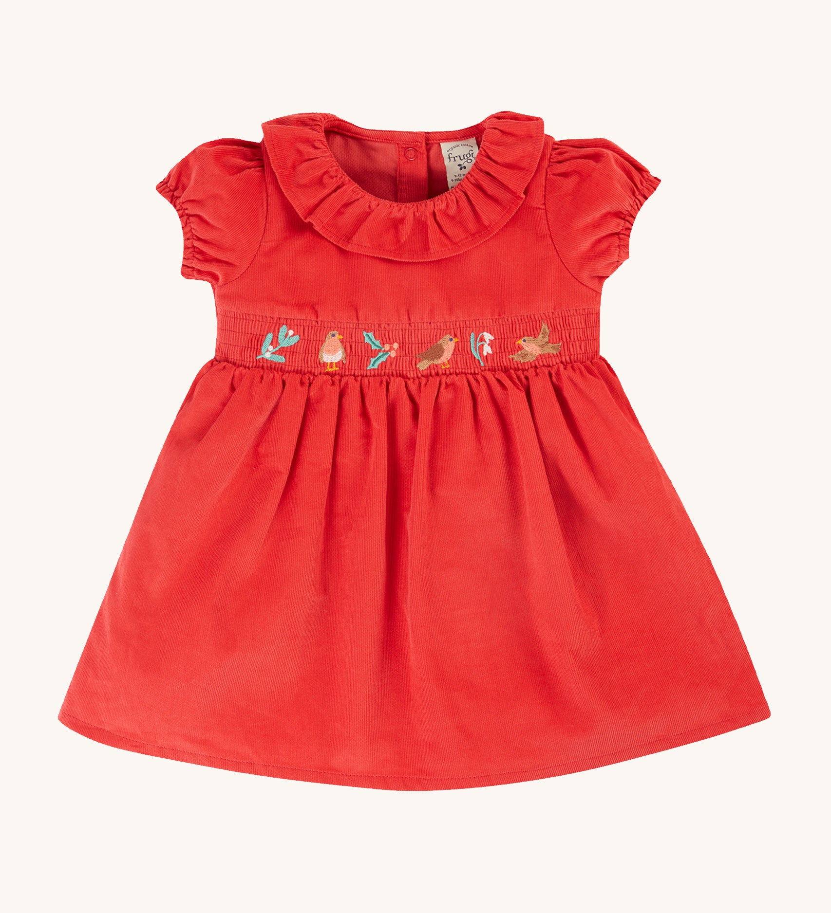 Frugi Amilie Party Dress - True Red/Robin. Made from soft organic cotton cord, in Red with a Robin embroidered on the front, this dress features a smocked panel with  a frill collar and gathered sleeves and poppers on the back for easy dressing.