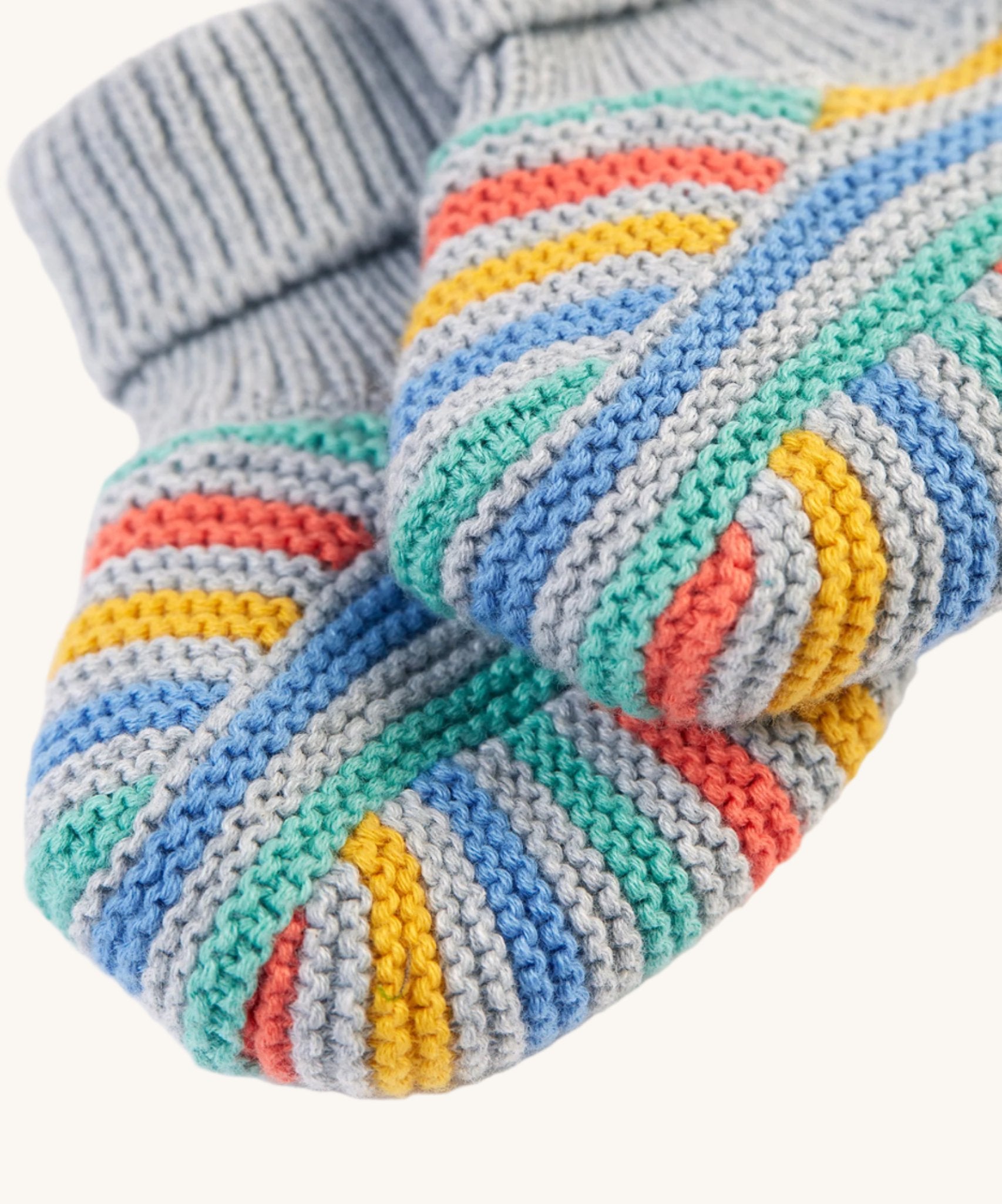 A closer look at the knit pattern and stripes on the Frugi Briar Knitted Booties - Grey Marl Stripe