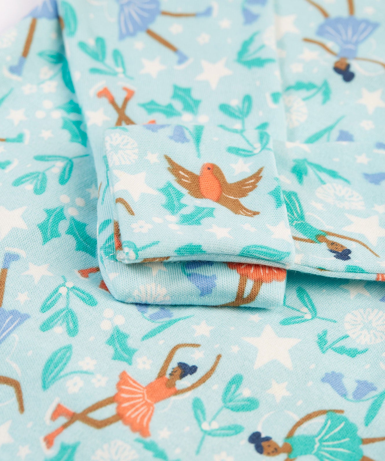 The scratch mittens that fold over the wrists on the Frugi Easy Dressing Printed Babygrow - Enchanted Forest. 