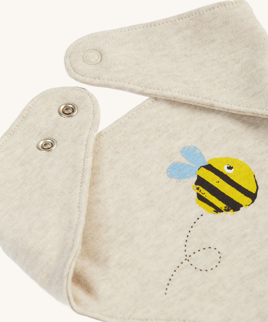 A closer look at the bib from the Frugi Baby Muslin Gift Set - Buzzy Bee