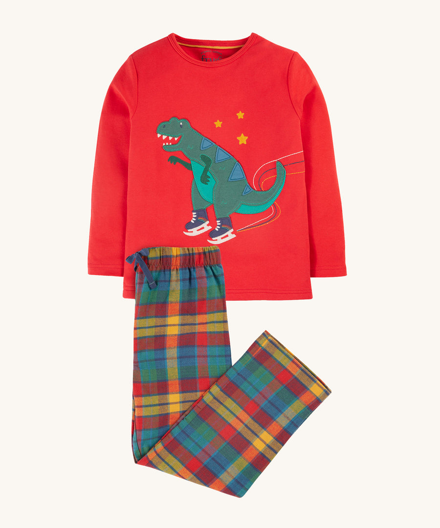 Frugi Caden Pyjamas - Merry Rainbow Check/Dinosaur. made from soft organic cotton, long-sleeves and has a festive dinosaur appliqué on the front. The bottoms have an elasticated waistband with a cotton drawcord