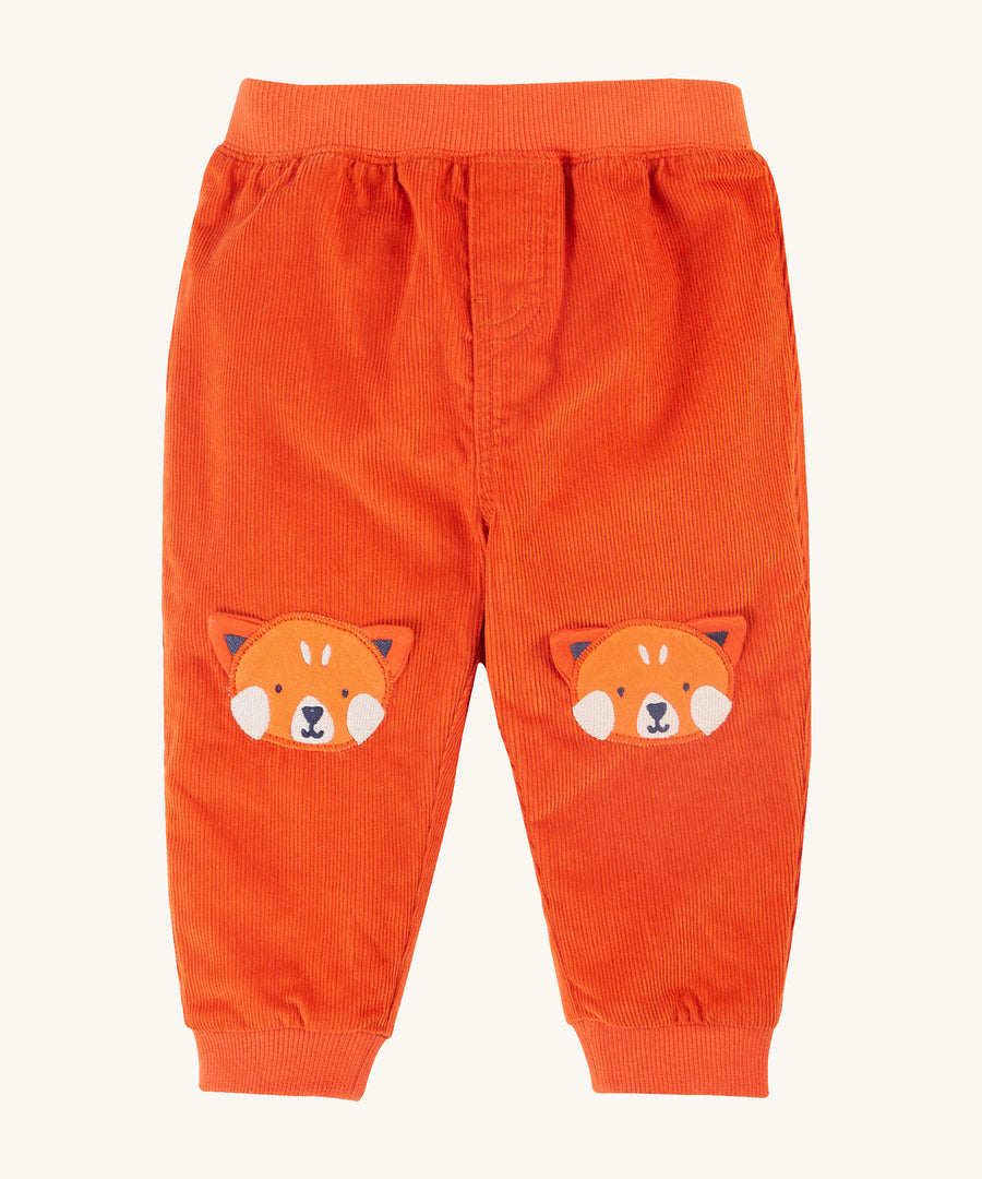 Frugi Cassius Cord Trousers - Bonfire/Red Panda. Made from orange organic cotton cord design with fun Red Panda knee patches, elasticated rib waistband and rib ankle cuffs