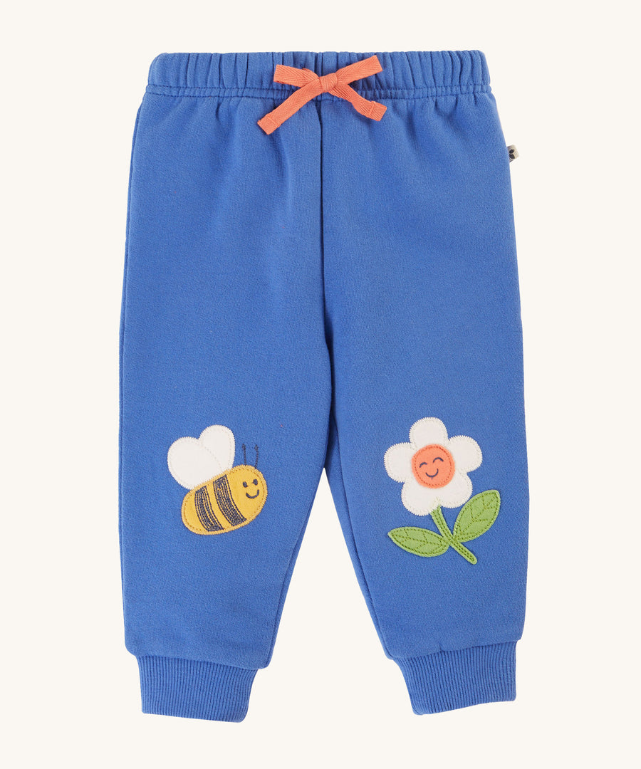 Frugi Character Crawlers - Blue Tang/Bee. Made from soft and durable organic cotton with a Bee and a flower appliqué on the knees, an elasticated waistband and a orange drawcord