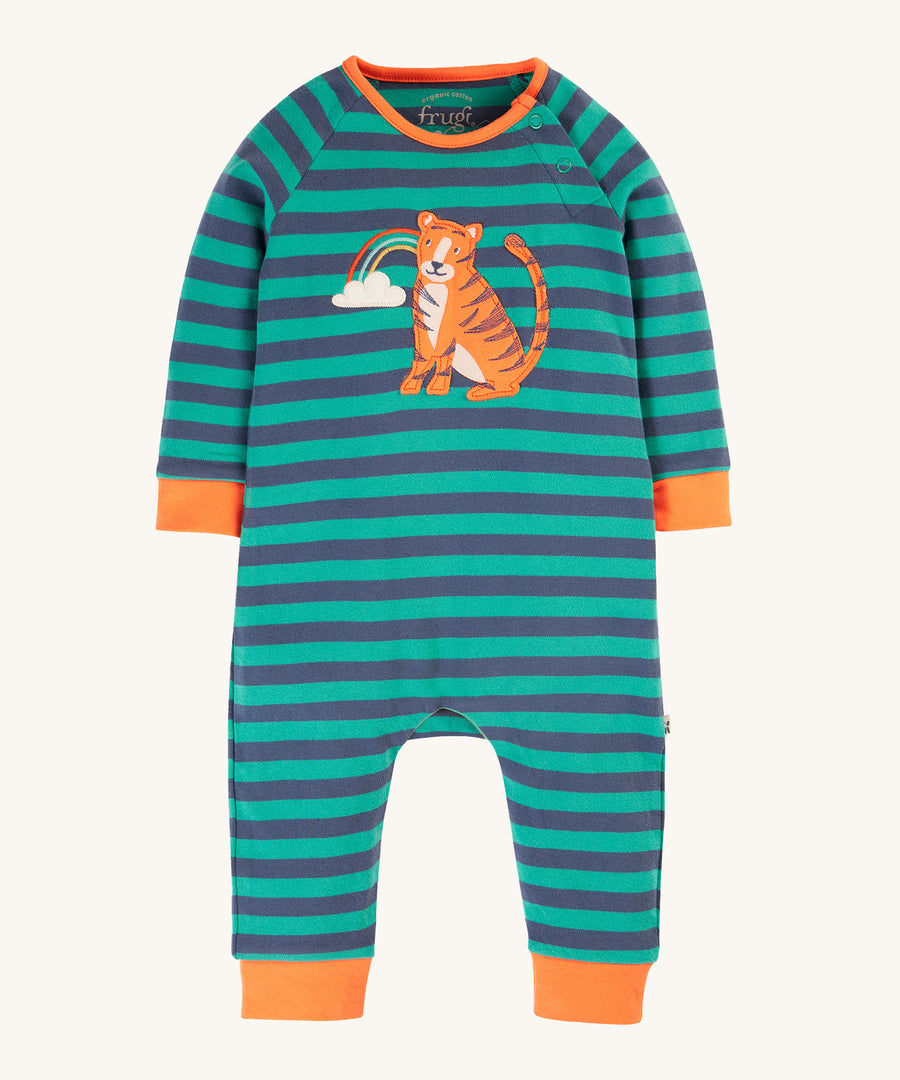 Frugi Rowan Romper - Iguana Stripe/Tiger. A green and navy stripe romper with orange detail and a fun tiger and rainbow applique