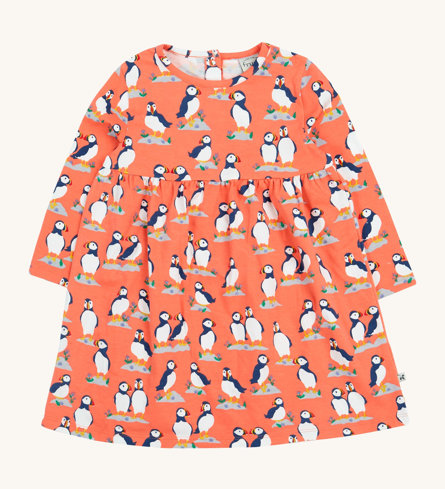 Frugi Dee Dress - Puffin Pals. A lovely peach dress with Frugi puffin print