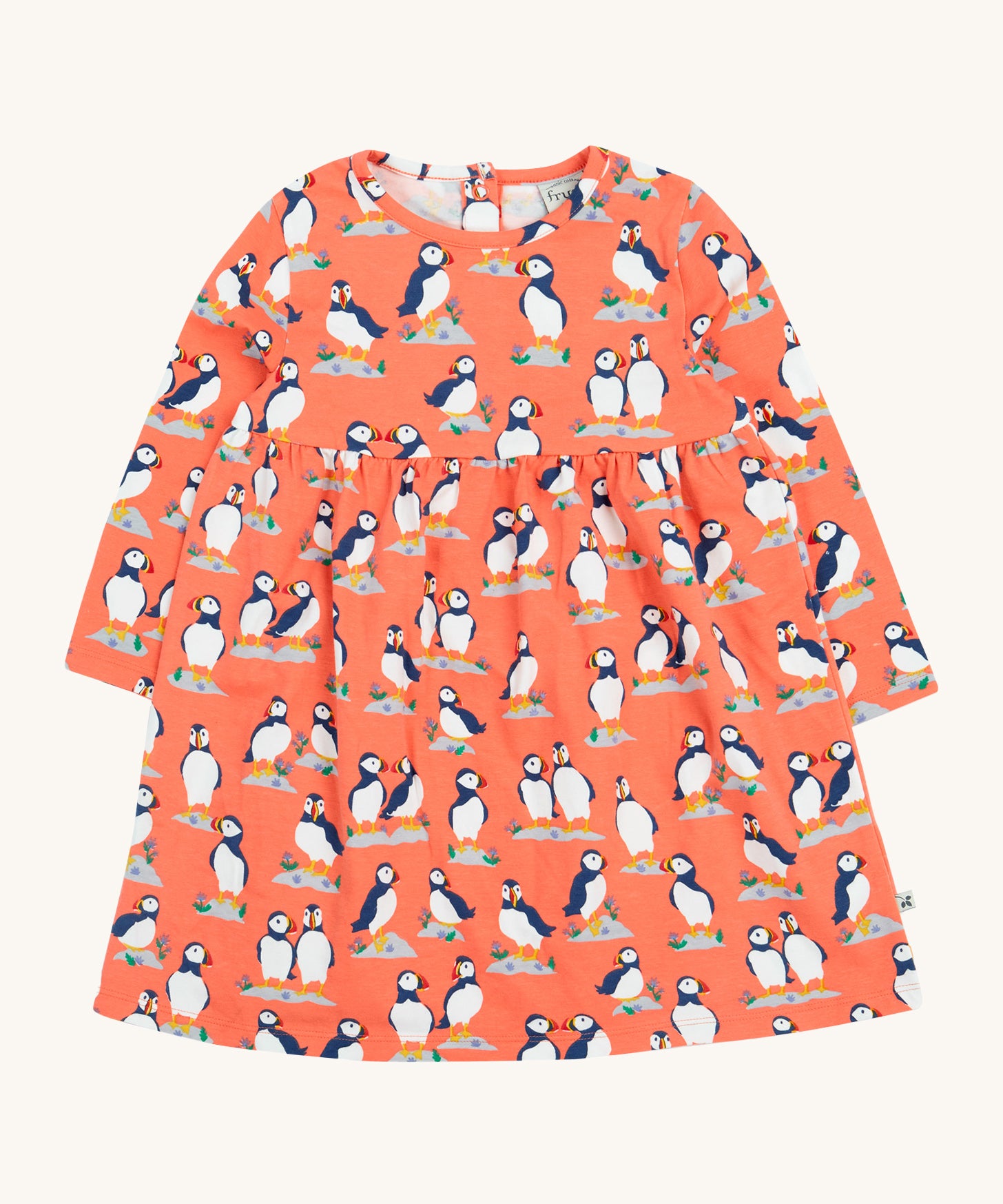 Frugi Dee Dress - Puffin Pals. A lovely peach dress with Frugi puffin print