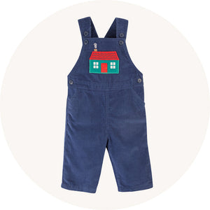 Frugi blue cord dungarees on cream background to represent Frugi dunagrees range at Babipur.