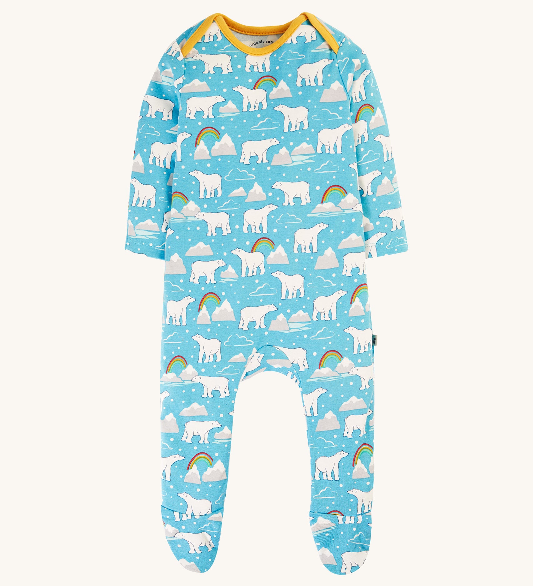 This Easy Dressing Babygrow from Frugi is made from soft organic cotton with a Winter Tales print on the front. The print consists of cute polar bears, icebergs, clouds, snow and rainbows. The babygrow also has yellow piping on the neck and shoulders