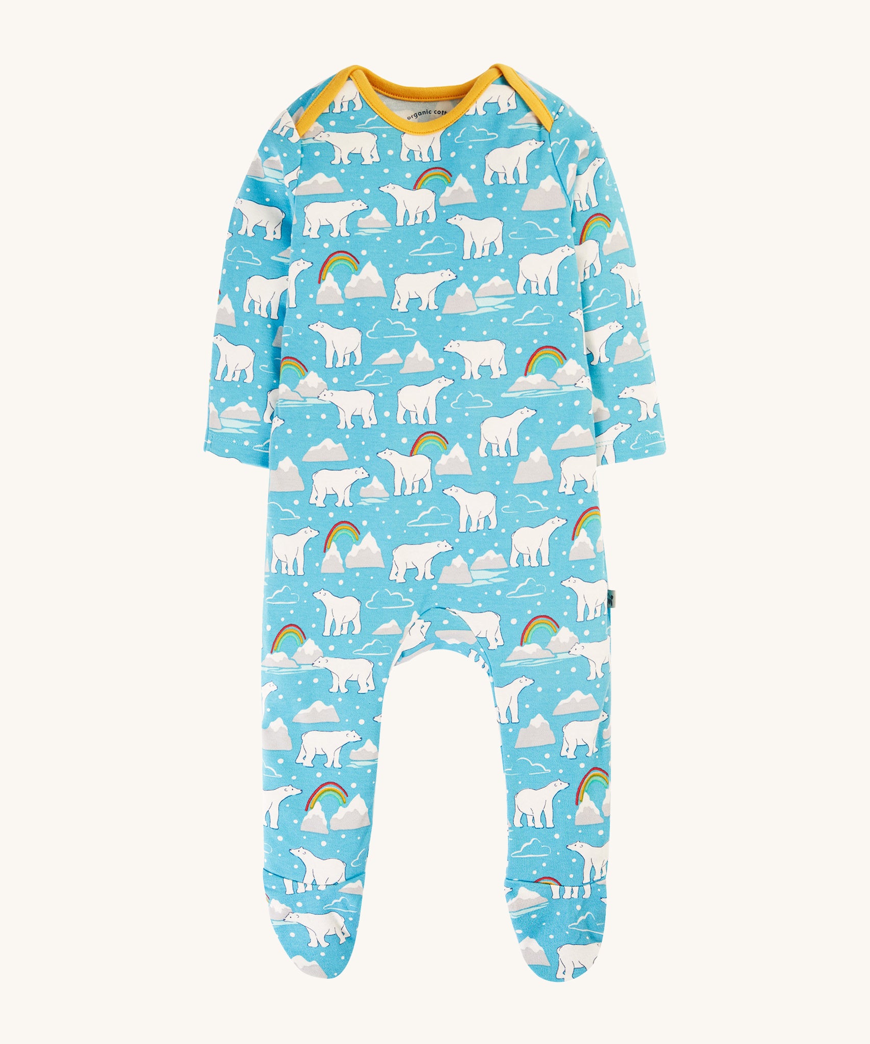 This Easy Dressing Babygrow from Frugi is made from soft organic cotton with a Winter Tales print on the front. The print consists of cute polar bears, icebergs, clouds, snow and rainbows. The babygrow also has yellow piping on the neck and shoulders