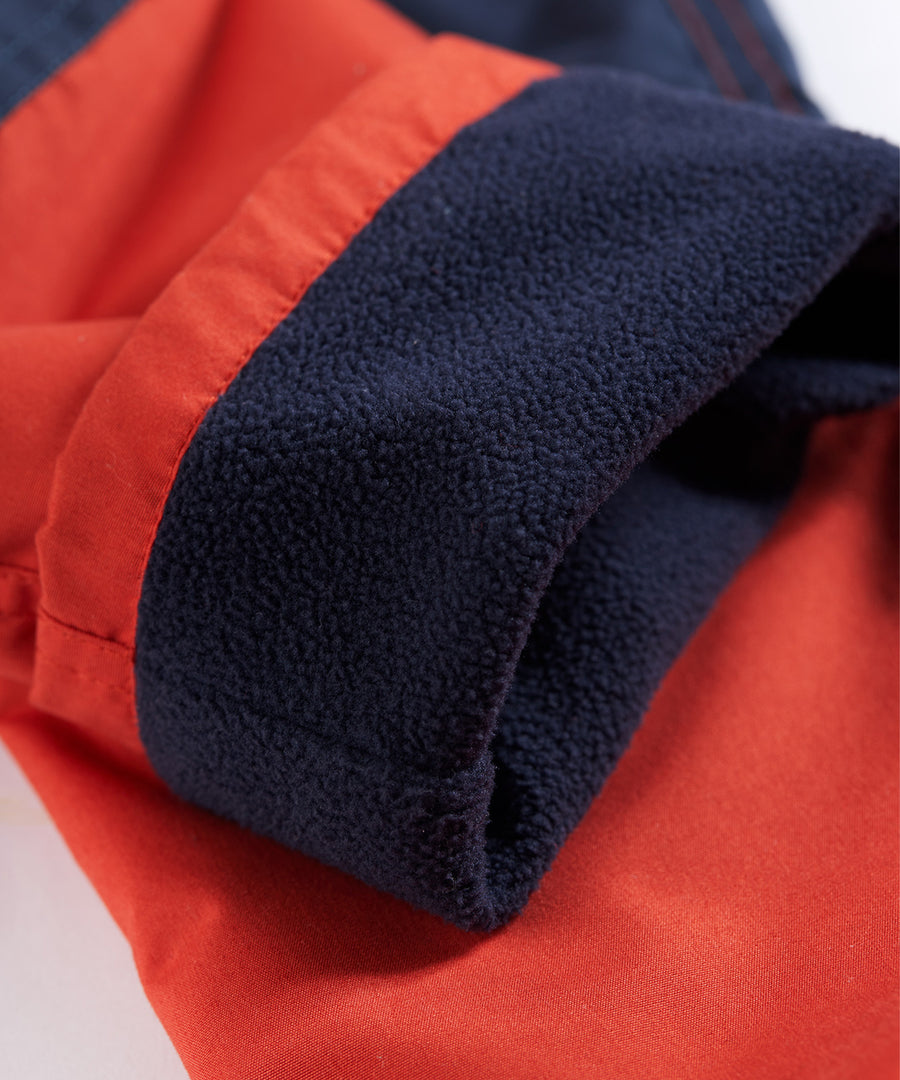 The fleece lining inside the Frugi Expedition Trousers - Paprika / Indigo