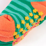 A closer look at the grippy dots on the bottom of the Frugi Grippy Socks 2 Pack - Giraffe