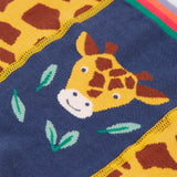 A closer look at the giraffe print on the front of the Frugi Little Knitted Leggings - Giraffe