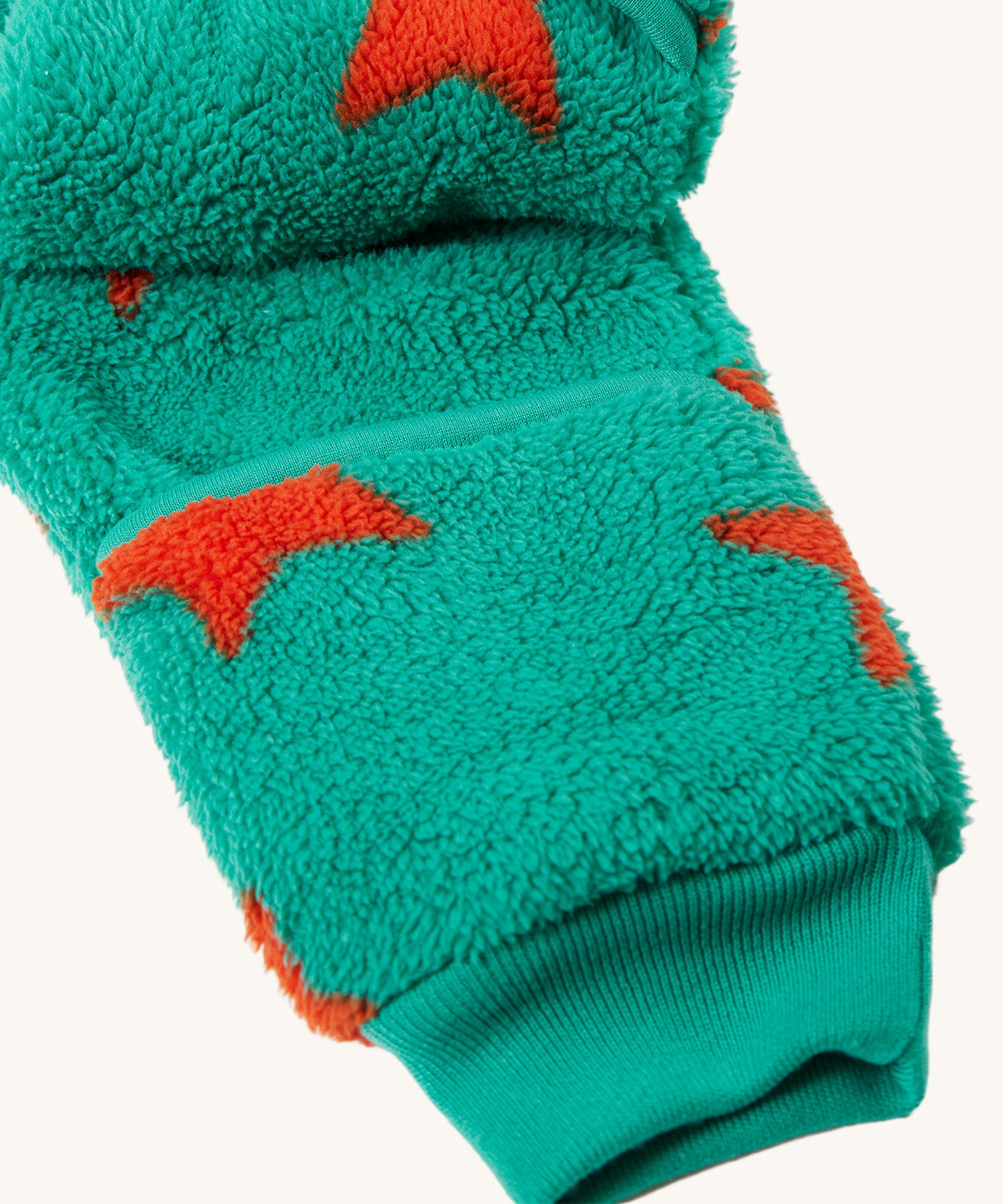 A look at the ankle cuffs on the Frugi Cosy Ted Snuggle Suit - Bonfire Stars