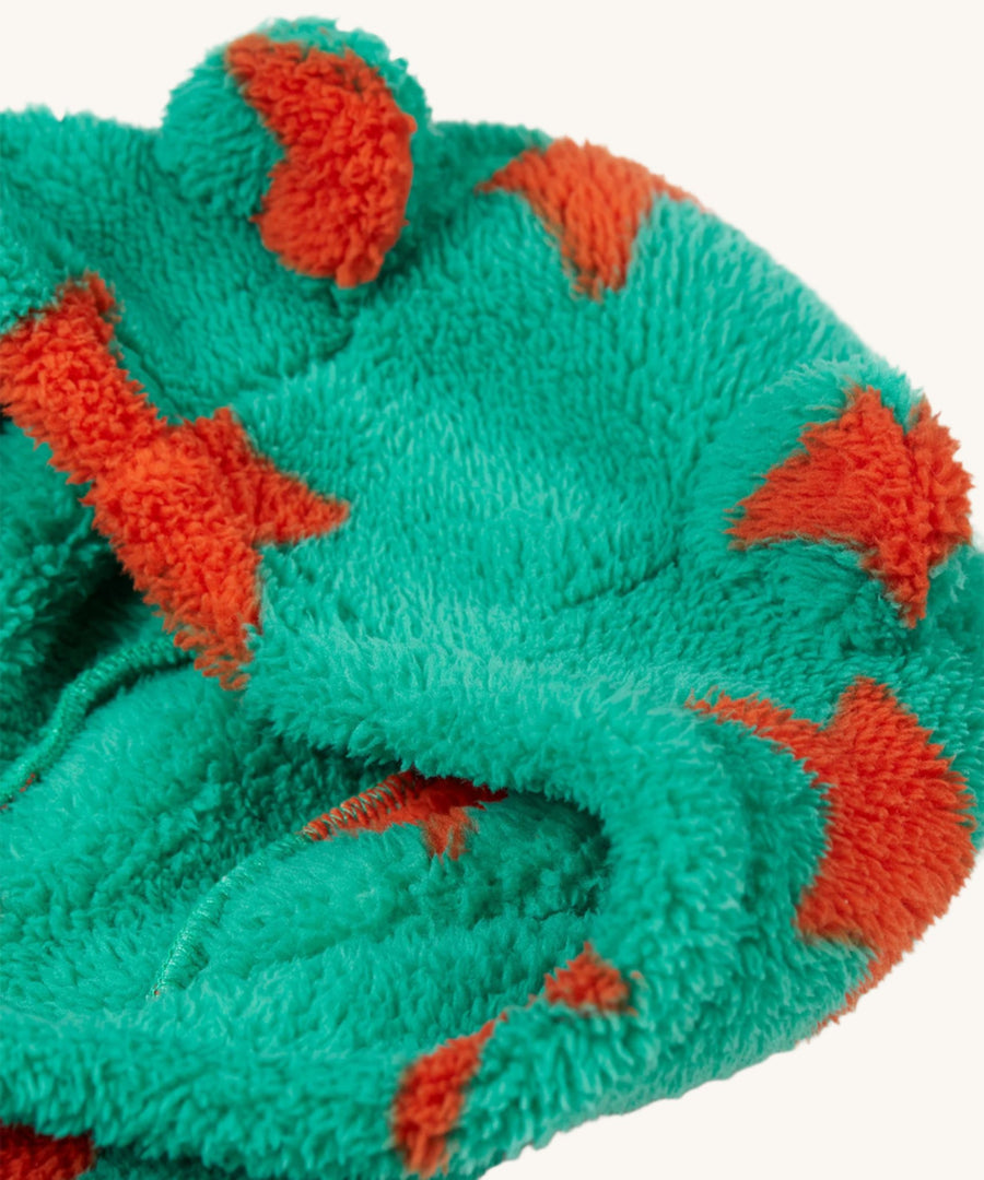 A closer look at the hood on the Frugi Cosy Ted Snuggle Suit - Bonfire Stars, showing the soft, teddy ears on top