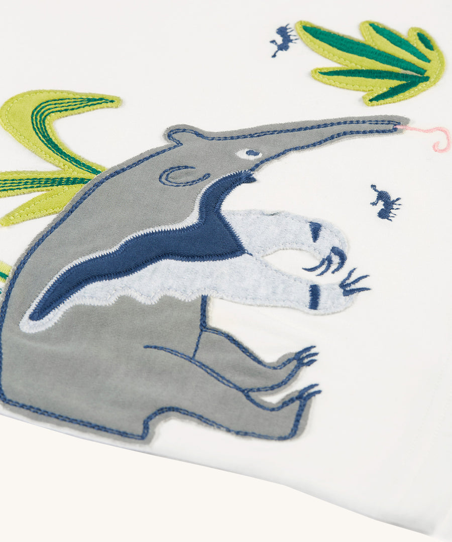 A closer look at the anteater applique on the Frugi Alfie Raglan Top - Navy Blue/Anteater