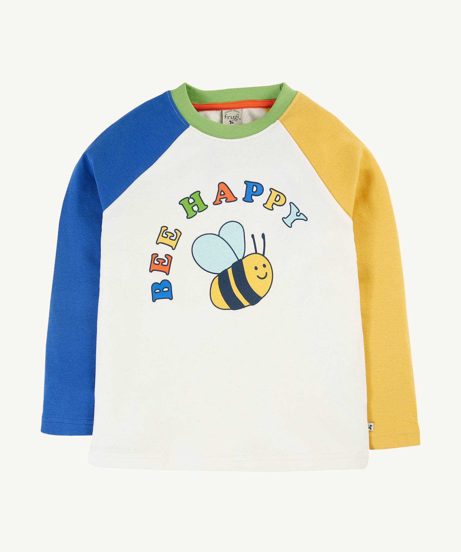 Frugi Tamar Raglan Top - Soft White/Bee Happy. A colourful, raglan top with one yellow and one blue sleeve, a green collar, a white body with a cute bee print and the words "Bee Happy" printed above