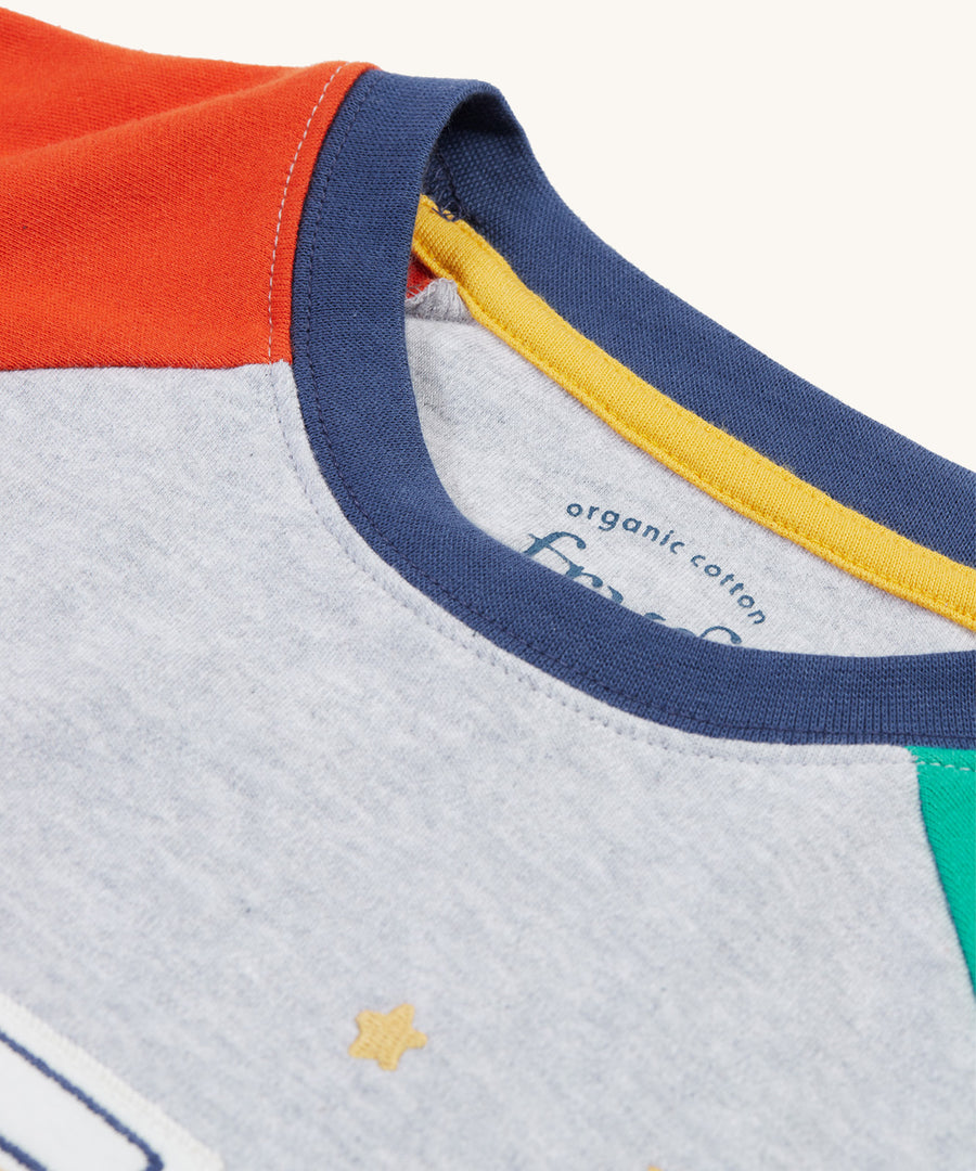 A closer view of the neck and colours of the Frugi Jamie Jim Jams - Iguana Stripe/Camper top